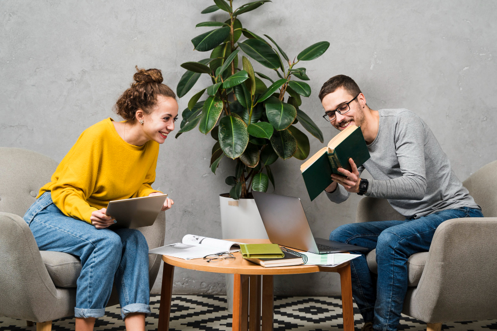 Counseling conversation with two people seated in chairs