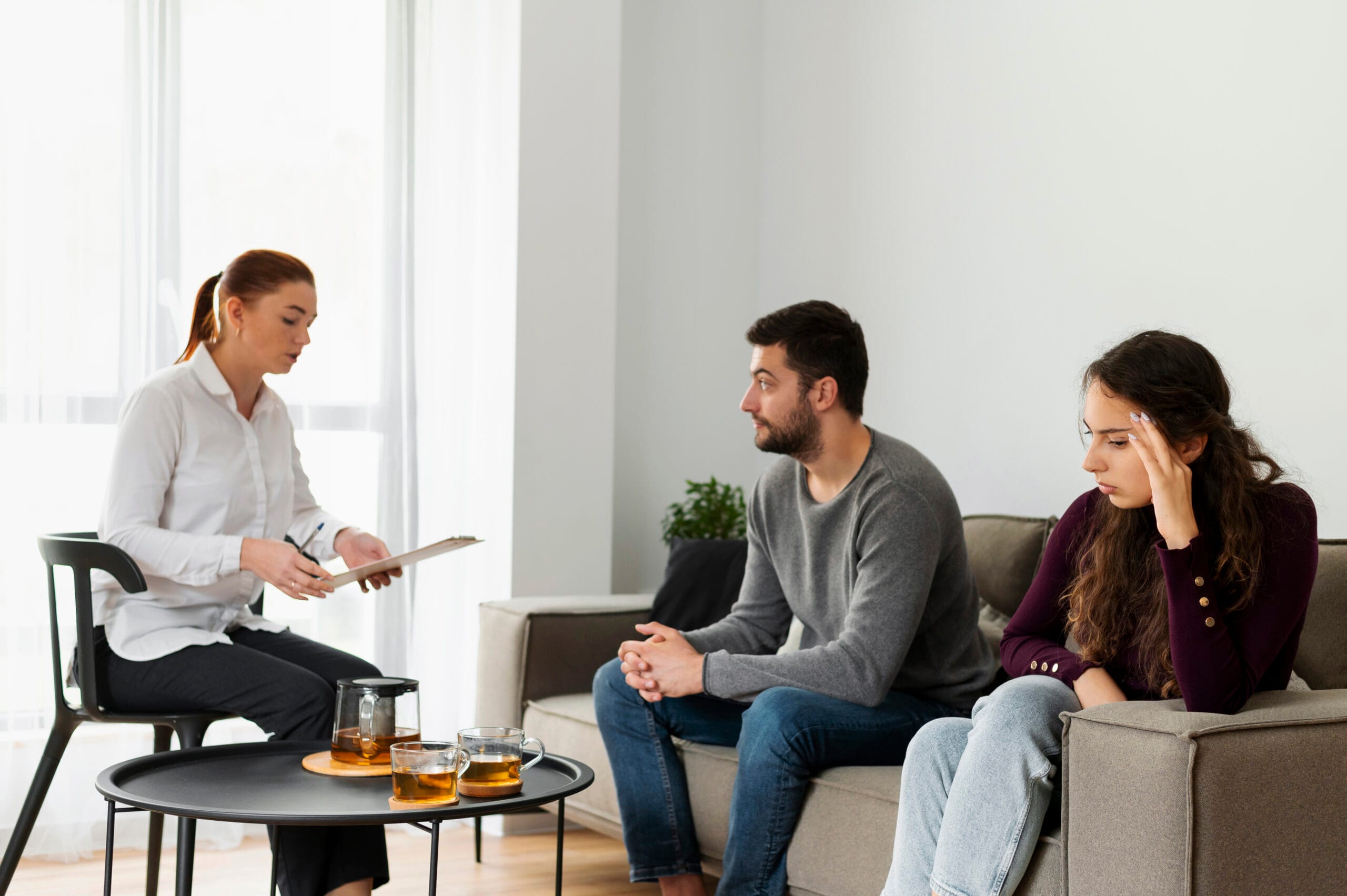Couple in a structured therapy session learning healthy boundary setting