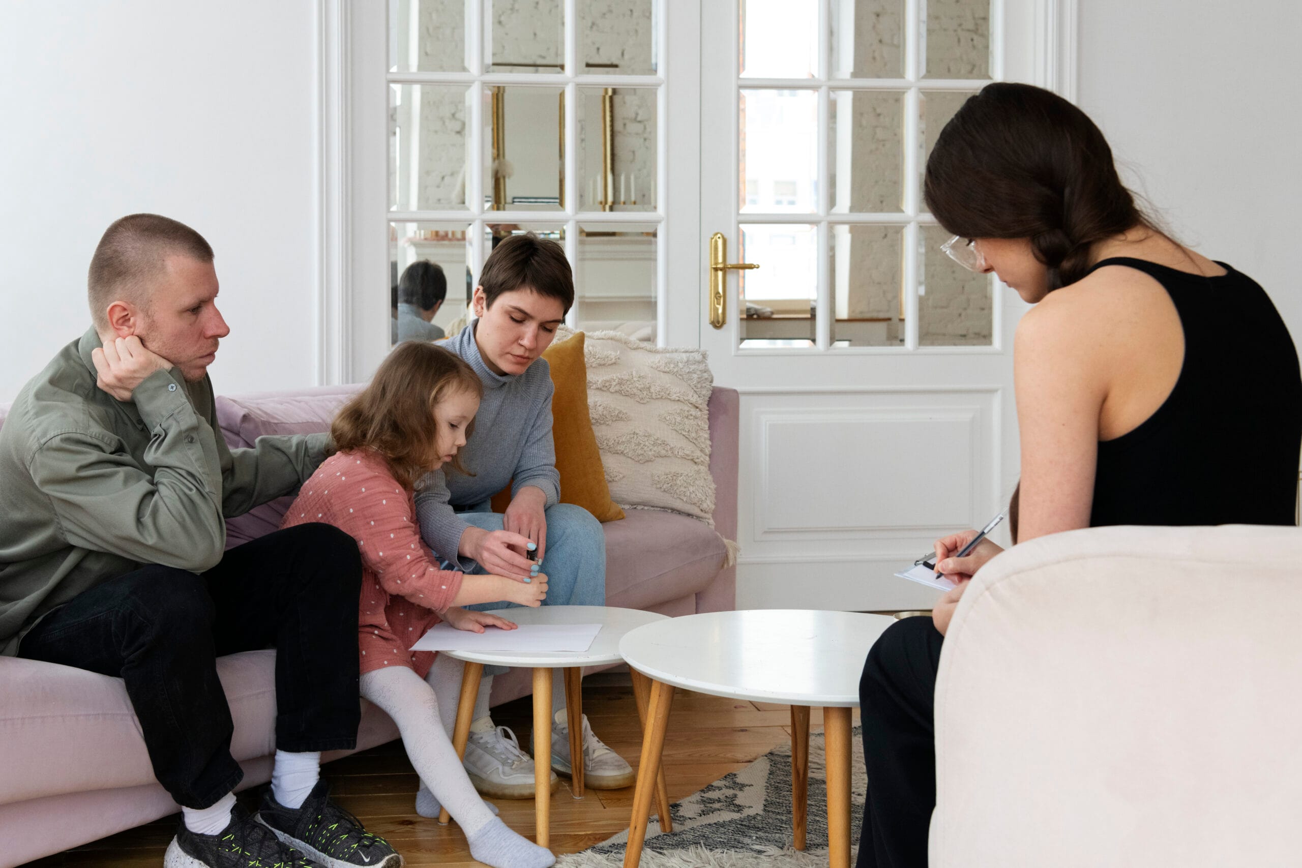 A family in a supportive session representing the first confidential call about a family intervention in Los Angeles
